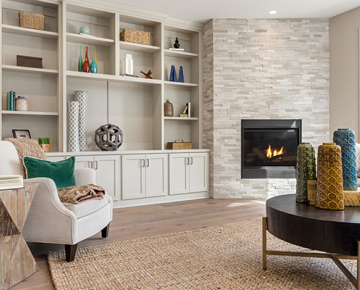 living room staged for an open house with neutral, warm colors