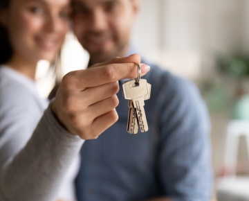 Couple Holding Keys
