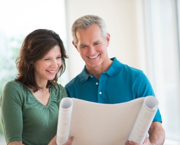 couple looking at architectural plans